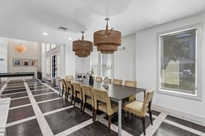 Oviedo apartment for rent - A dining room with a long table and chairs.