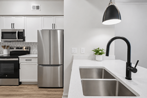 Atlanta apartment for rent - A modern kitchen with a stainless steel refrigerator and a black oven.