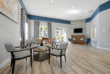 Altamonte Springs apartment for rent - A living room with a grey sofa and a coffee table.