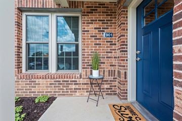Exton apartment for rent - A blue door with a sign on the mat that says "HOME SLUT".