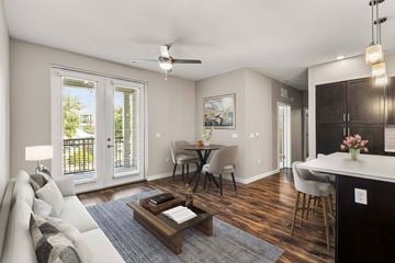 Newberry apartment for rent - A living room with a white couch and a coffee table.