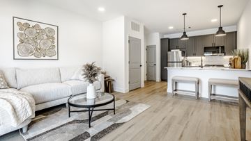 Westfield apartment for rent - A modern living room with a white sofa and a coffee table.