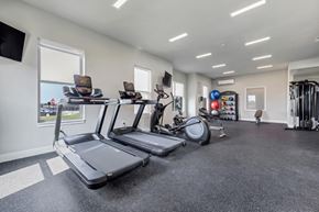 Dardenne Prairie apartment for rent - the gym at The Prairie Luxury Apartments, Dardenne Prairie, MO