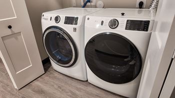 Full -size front load washer/dryer in unit