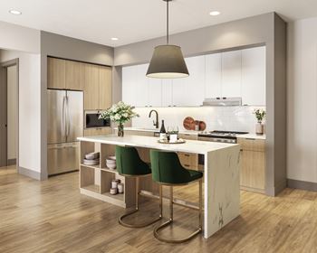 Modern kitchen with island seating and wood cabinetry