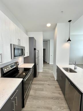 St Louis apartment for rent - A modern kitchen with dark wood cabinets and stainless steel appliances.