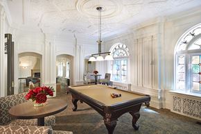 Saint Louis apartment for rent - white room with pool table in center at Residences at Forest Park, Saint Louis, MO