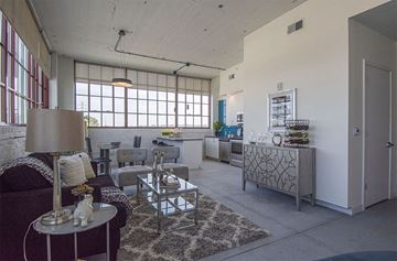 St Louis apartment for rent - a living room with a couch and a table