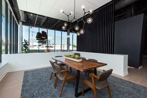 St. Louis apartment for rent - Lobby with stylish table and lighting at Steelcote Square, St. Louis, MO, 63103