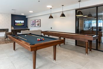 Game room with pool table and shuffleboard