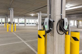 Electric vehicle charging stations in parking garage