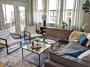 Granger apartment for rent - Contemporary living room with modern furnishings at GrandView Flats and Townhomes Apartments, Granger, IN