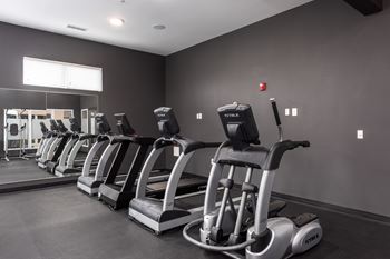 24 Hour fitness center with free weights & cardio