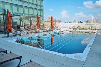 South facing, 7th floor sundeck with pool, jacuzzi, cabanas and grills