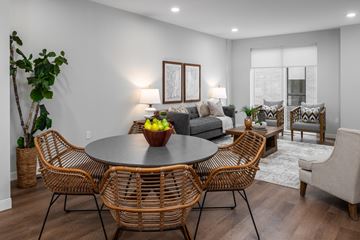 Chesterfield apartment for rent - A modern dining room with a round table and chairs.