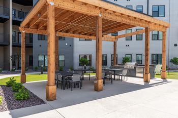Pergola with table and chairs