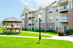 Swansea apartment for rent - exterior of building with vinyl siding at Villas At Crystal Lake, Swansea, Illinois