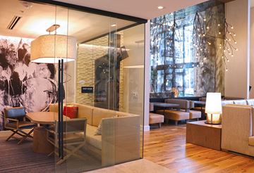 Chesterfield apartment for rent - a living room with a table and chairs and a large glass door