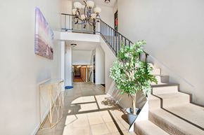Mar Vista apartment for rent - the entryway of a house with stairs and a plant