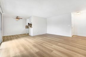Los Angeles apartment for rent - A room with a ceiling fan and wooden flooring.