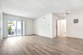 Los Angeles apartment for rent - A room with wooden flooring and a ceiling fan.