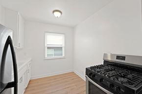 Los Angeles apartment for rent - A kitchen with a stove and a window.