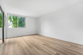 Santa Monica apartment for rent - A room with a window and wooden flooring.