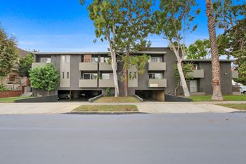 Los Angeles apartment for rent - Apartment building with a tree in front.