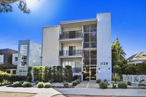 Santa Monica apartment for rent - A modern building with the number 1128 on it.
