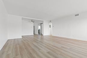 Santa Monica apartment for rent - A room with wooden flooring and a ceiling fan.