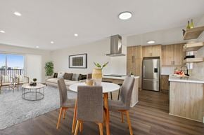 West Hollywood apartment for rent - A modern kitchen with a dining table and chairs.