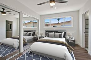 West Hollywood apartment for rent - A bedroom with two beds and a ceiling fan.