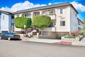 Mar Vista apartment for rent - an apartment building with a car parked in front of it