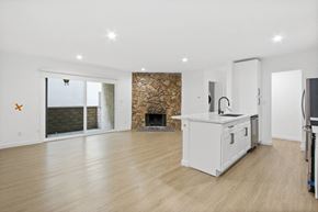 Mar Vista apartment for rent - a living room with a kitchen and a fireplace