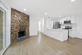 Mar Vista apartment for rent - a living room with a fireplace and a kitchen