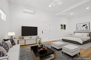 Santa Monica apartment for rent - A modern living room with a large bed and a flat screen TV.