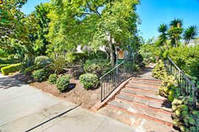 Santa Monica apartment for rent - A garden with a staircase and a metal railing.