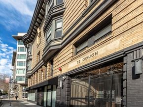 San Francisco apartment for rent - A building with a sign that says "72 Gough" on it.