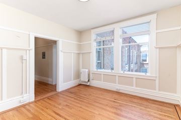 San Francisco apartment for rent - A room with a window and a radiator on the wall.