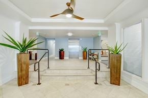 Santa Monica apartment for rent - A hallway with a ceiling fan and potted plants.