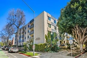 Santa Monica apartment for rent - A street view of a building with a sign that reads "BARCELONA".