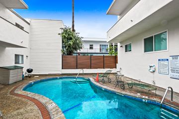 West Hollywood apartment for rent - A small residential pool surrounded by a brick border.