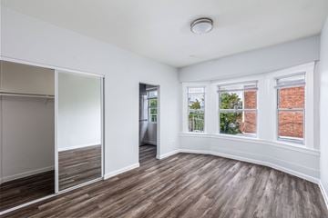 San Francisco apartment for rent - A room with a sliding door and a window.
