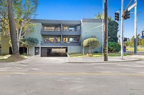 Los Angeles apartment for rent - A modern building with a grey facade and a black gate.