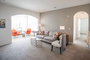 Charles Town apartment for rent - a living room with a couch and chairs and a table