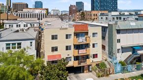 Los Angeles apartment for rent - A view of a city with buildings of different heights and colors.