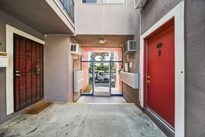 North Hills apartment for rent - A red door is on the right side of the image.
