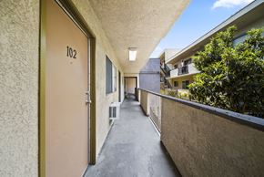 Los Angeles apartment for rent - A hallway with a door numbered 102.