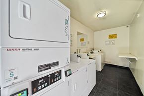 North Hills apartment for rent - A laundry room with a washing machine and a dryer.