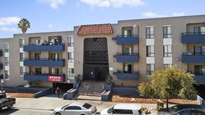 Los Angeles apartment for rent - A building with a red sign that says "No Parking" in front of it.